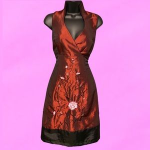 Burgundy cheongsam style dress.